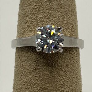 7mm Round. Genuine White D-color, Flawless Moissanite solitaire, VVSI. Size 5.